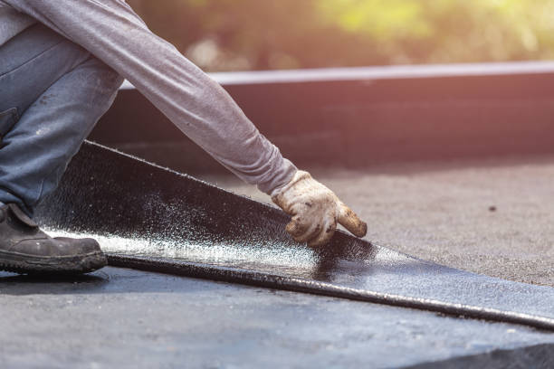 Professional Waterproofing technician working in Baldwin, PA